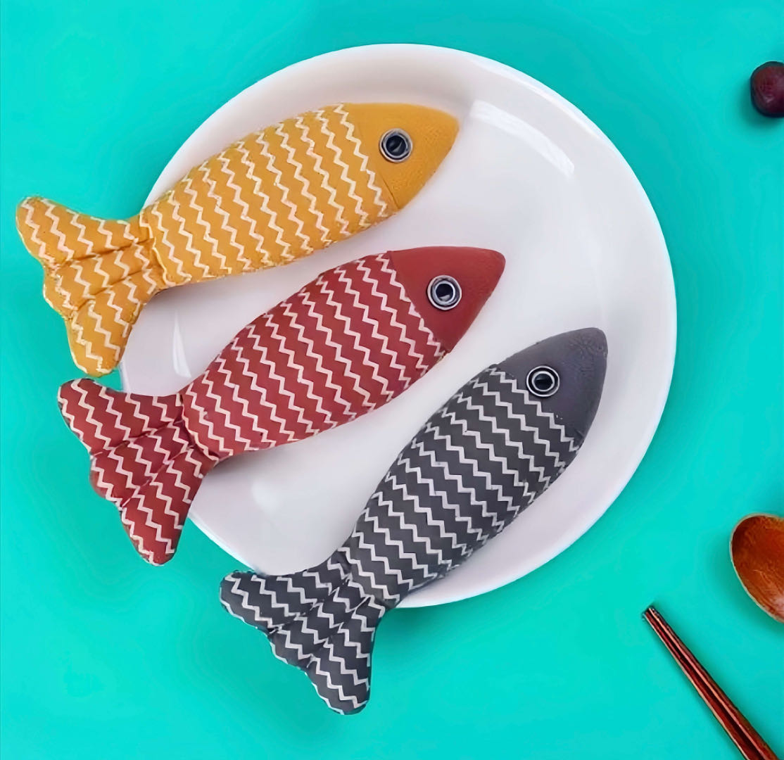 Three Stuffed Fish Cat Toy With Catnip On The Plate petvibez