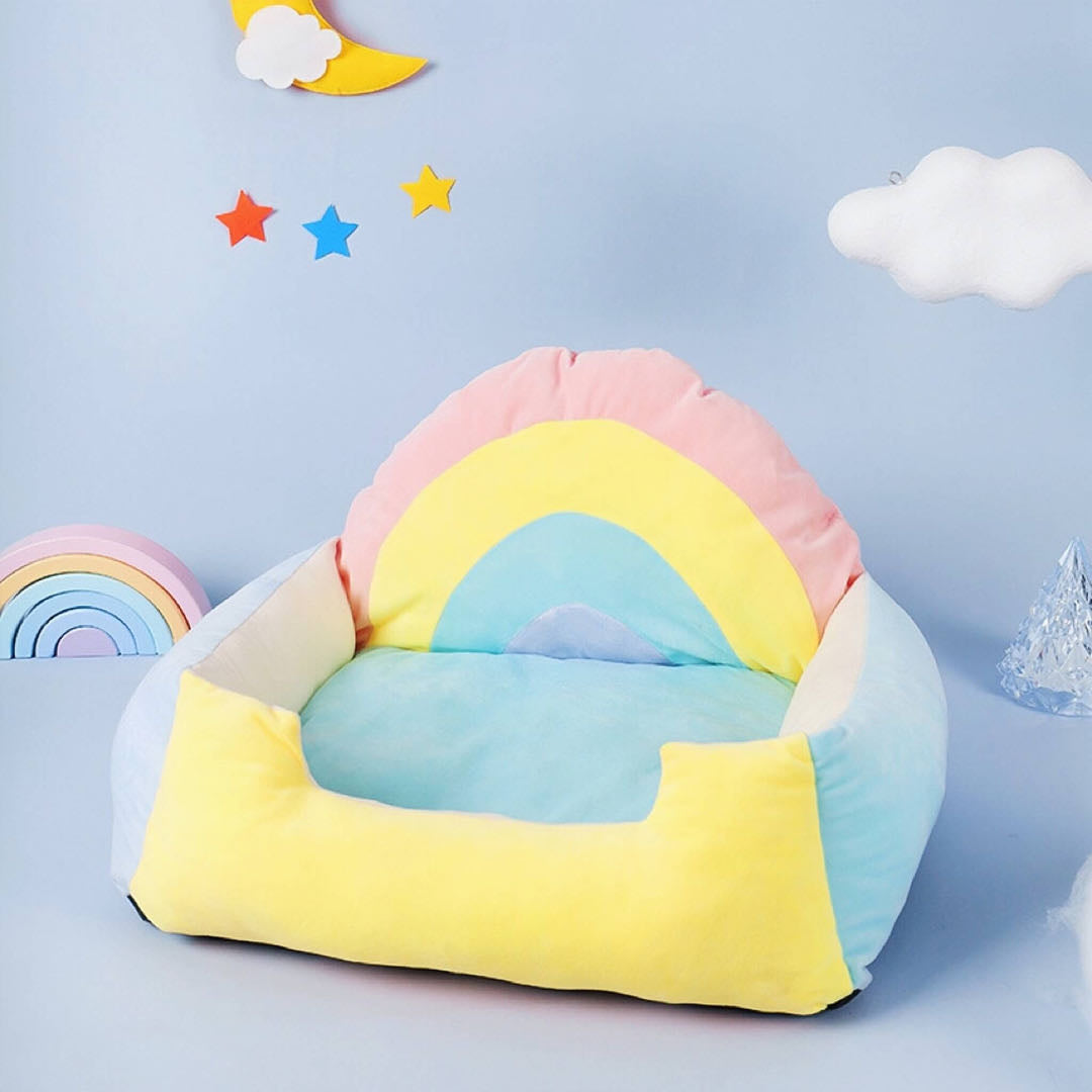 A rainbow colour sofa styled pet bed