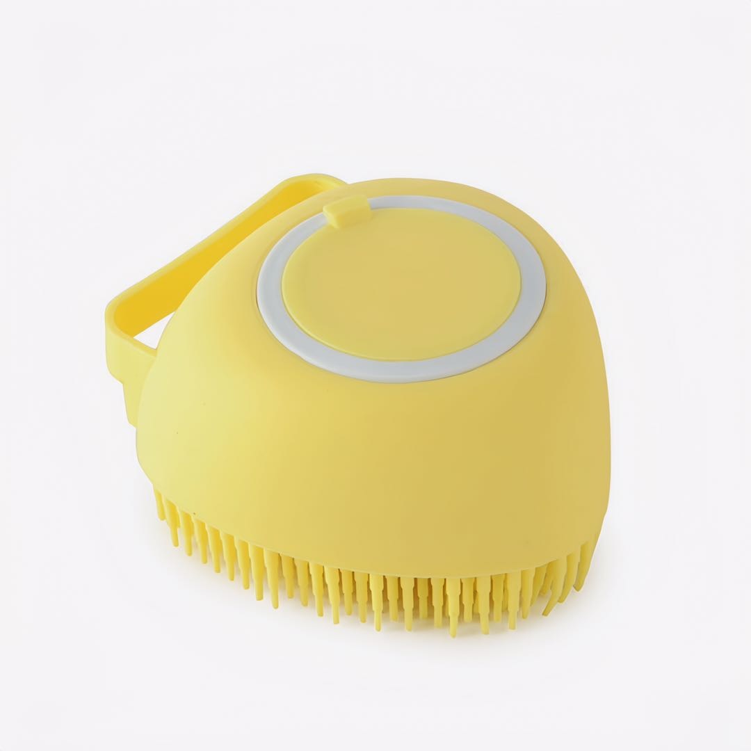 A yellow heart shaped soft silicon pet bathing brush top and bottom petvibez