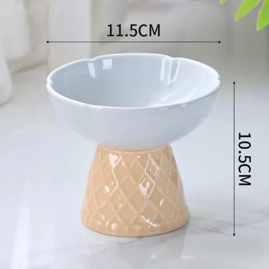 A White Colour Ceramic Pet Bowl With Ice Cream Cone Base And Round Bowl